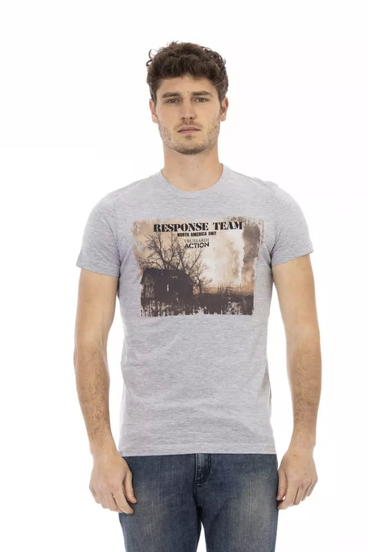 Man wearing gray t-shirt with graphic design on front