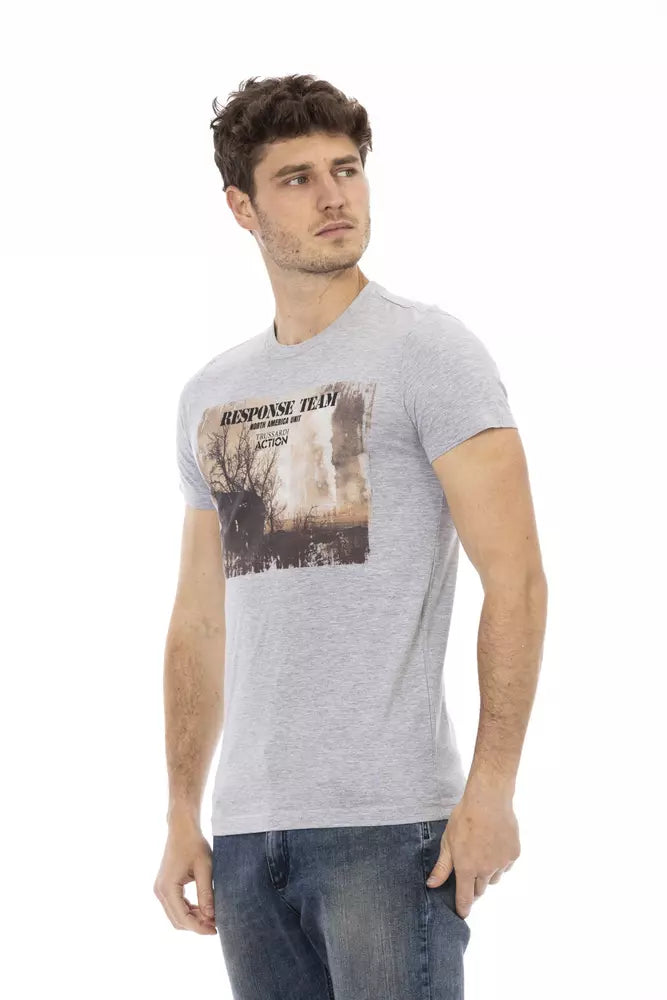 Man wearing gray t-shirt with graphic design on front