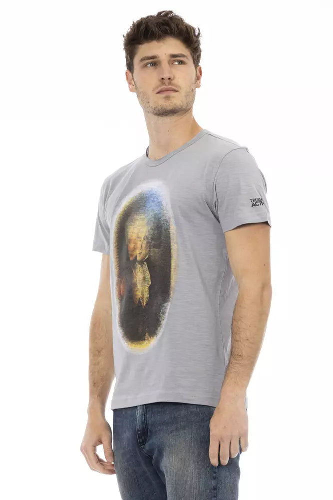 Man wearing gray t-shirt with graphic print on front