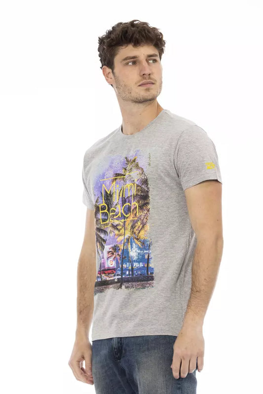 Man wearing gray t-shirt with graphic design on front