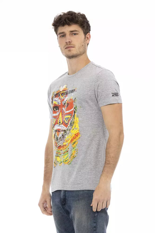 Man wearing gray t-shirt with graphic design on front