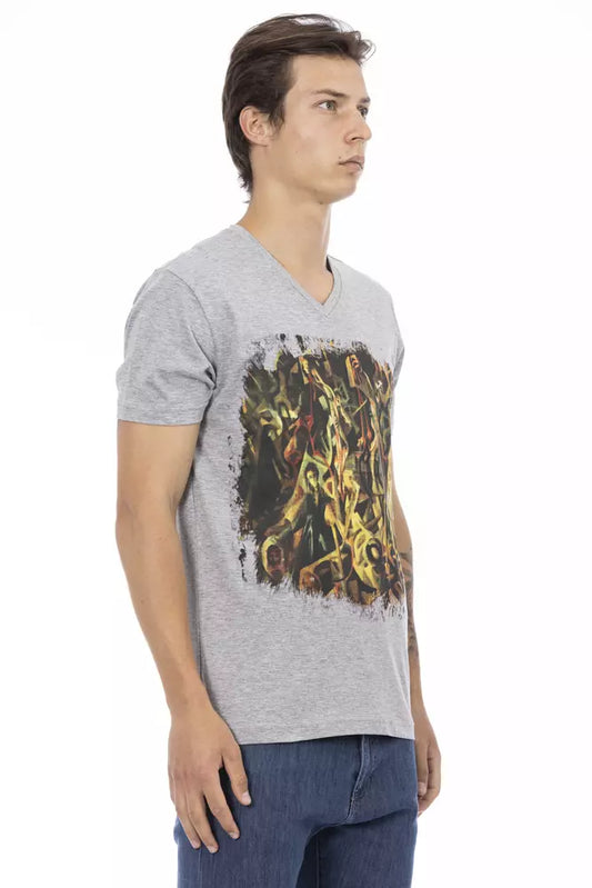 Man wearing gray t-shirt with graphic design on front