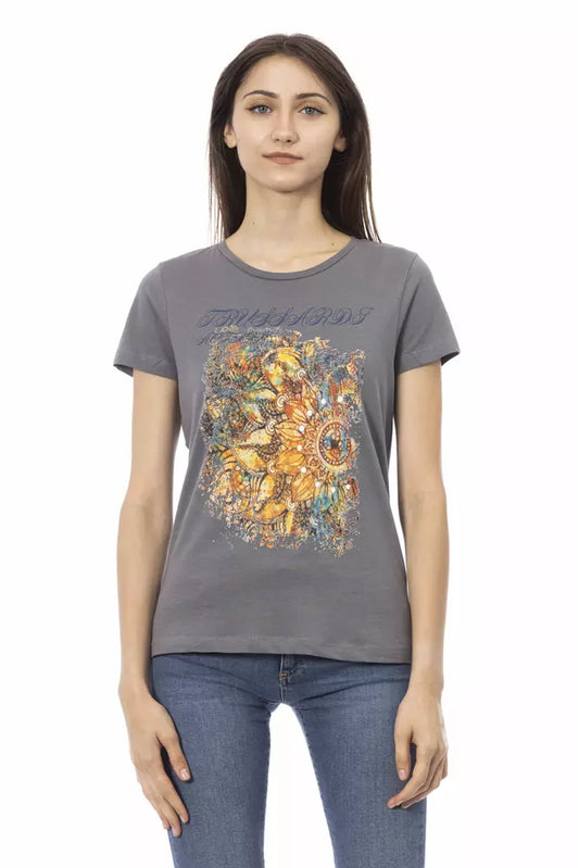 Woman wearing gray t-shirt with colorful graphic print