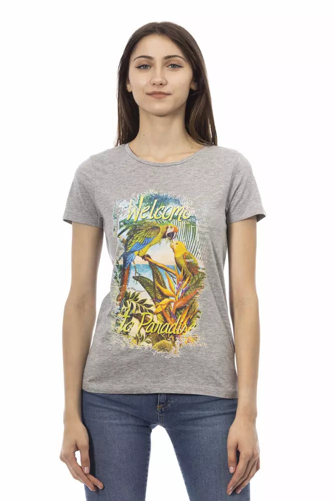 Woman wearing gray t-shirt with colorful graphic design