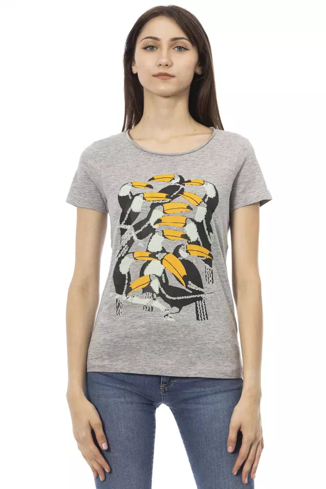 Woman wearing gray t-shirt with yellow graphic design