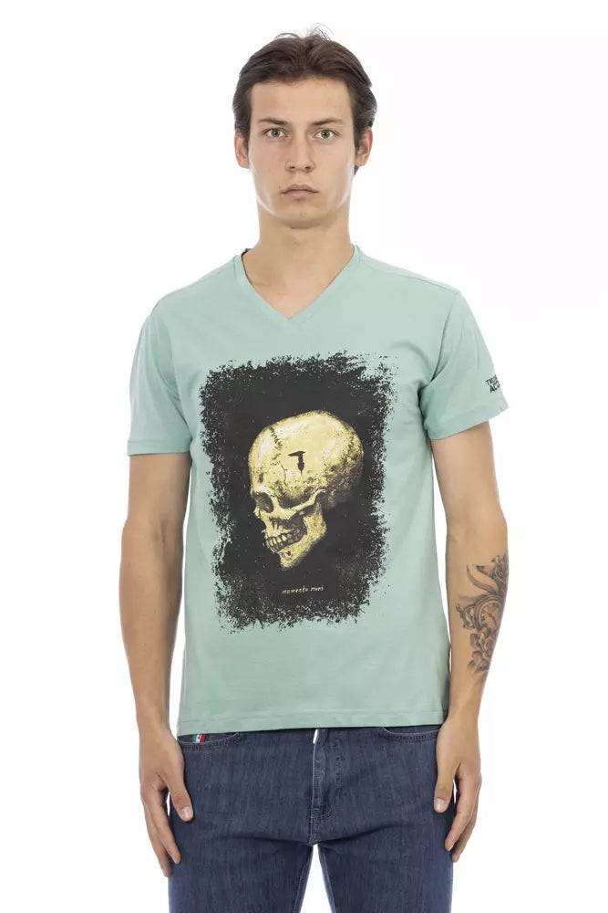Man wearing a light blue t-shirt with a skull graphic on the front