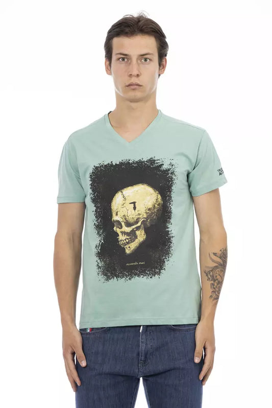 Man wearing a light blue t-shirt with a skull graphic on the front