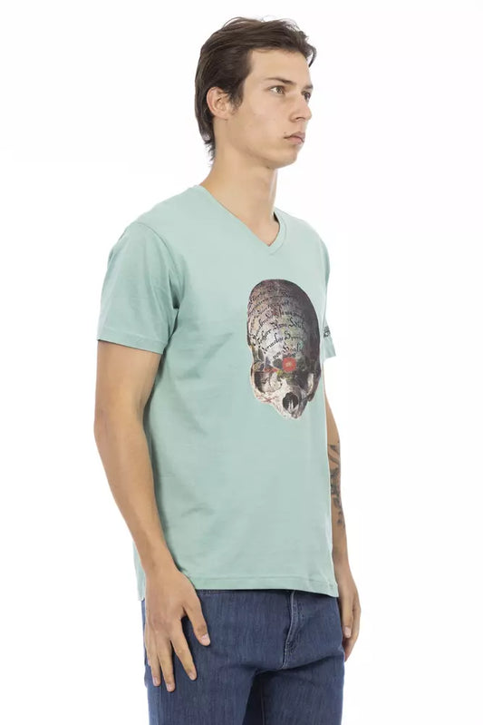 Man wearing a light blue t-shirt with a skull design on the front