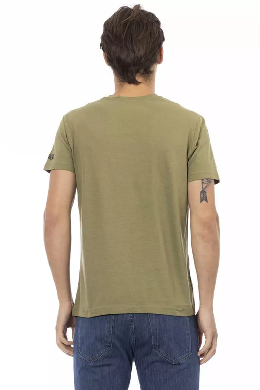 Man wearing olive green t-shirt and blue jeans