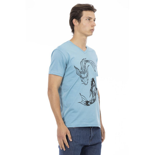 Man wearing blue t-shirt with graphic design on front
