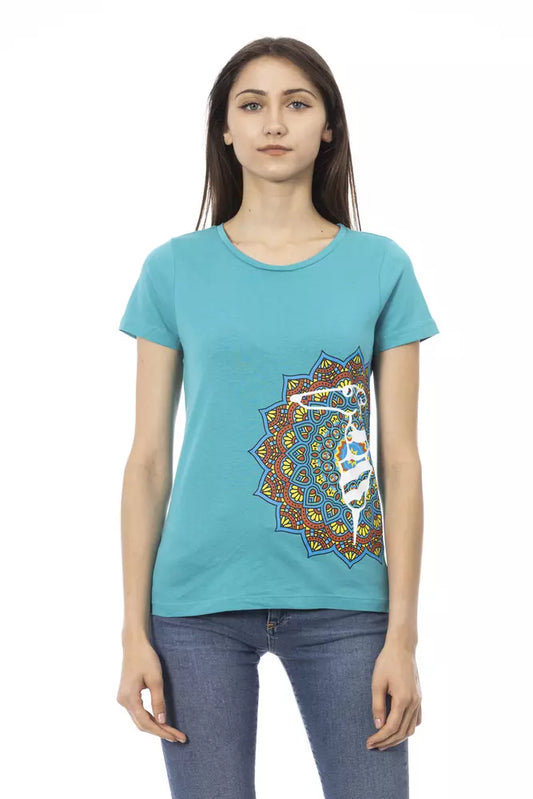 Woman wearing blue t-shirt with colorful design on front