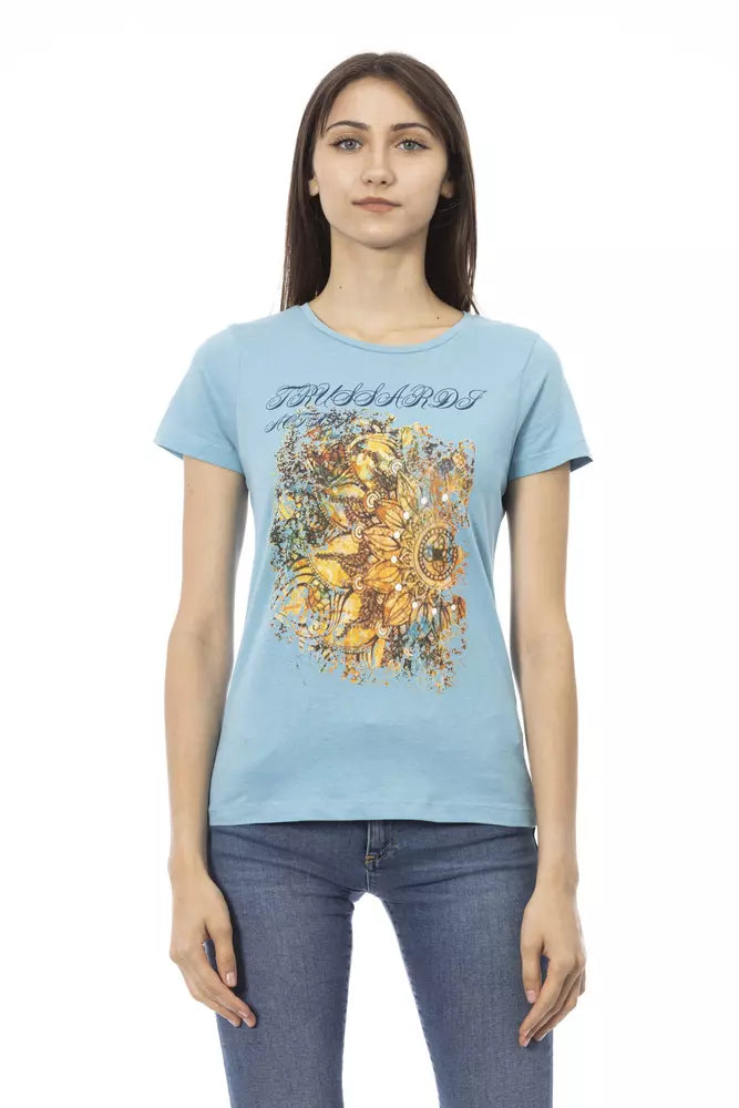 Woman wearing blue t-shirt with graphic design on front