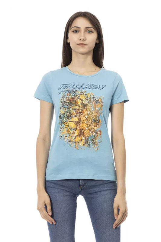 Woman wearing blue t-shirt with graphic design on front