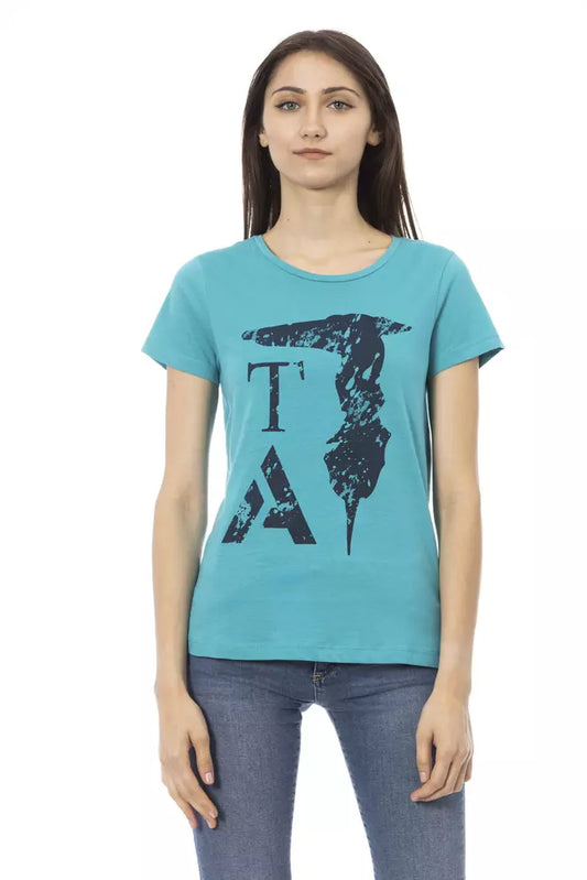 Woman wearing blue t-shirt with graphic design on front