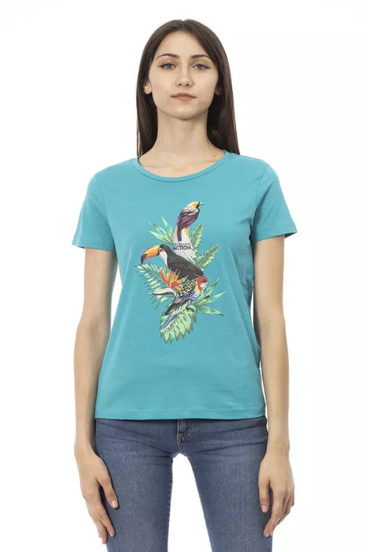 Woman wearing blue t-shirt with colorful bird design