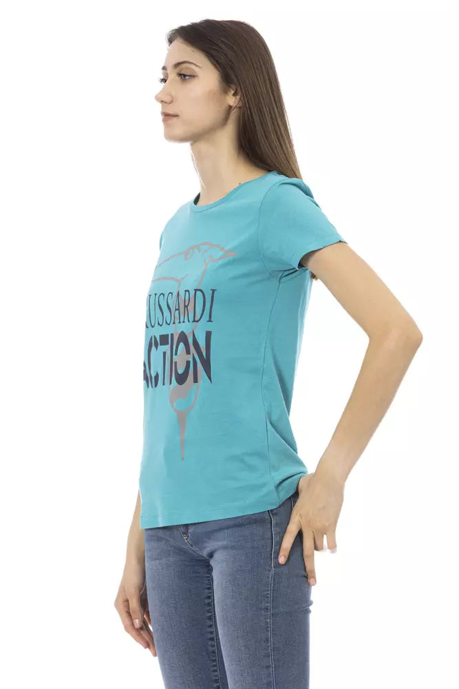 Woman wearing blue shirt with graphic design on front