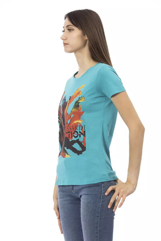 Woman wearing blue t-shirt with graphic design on front