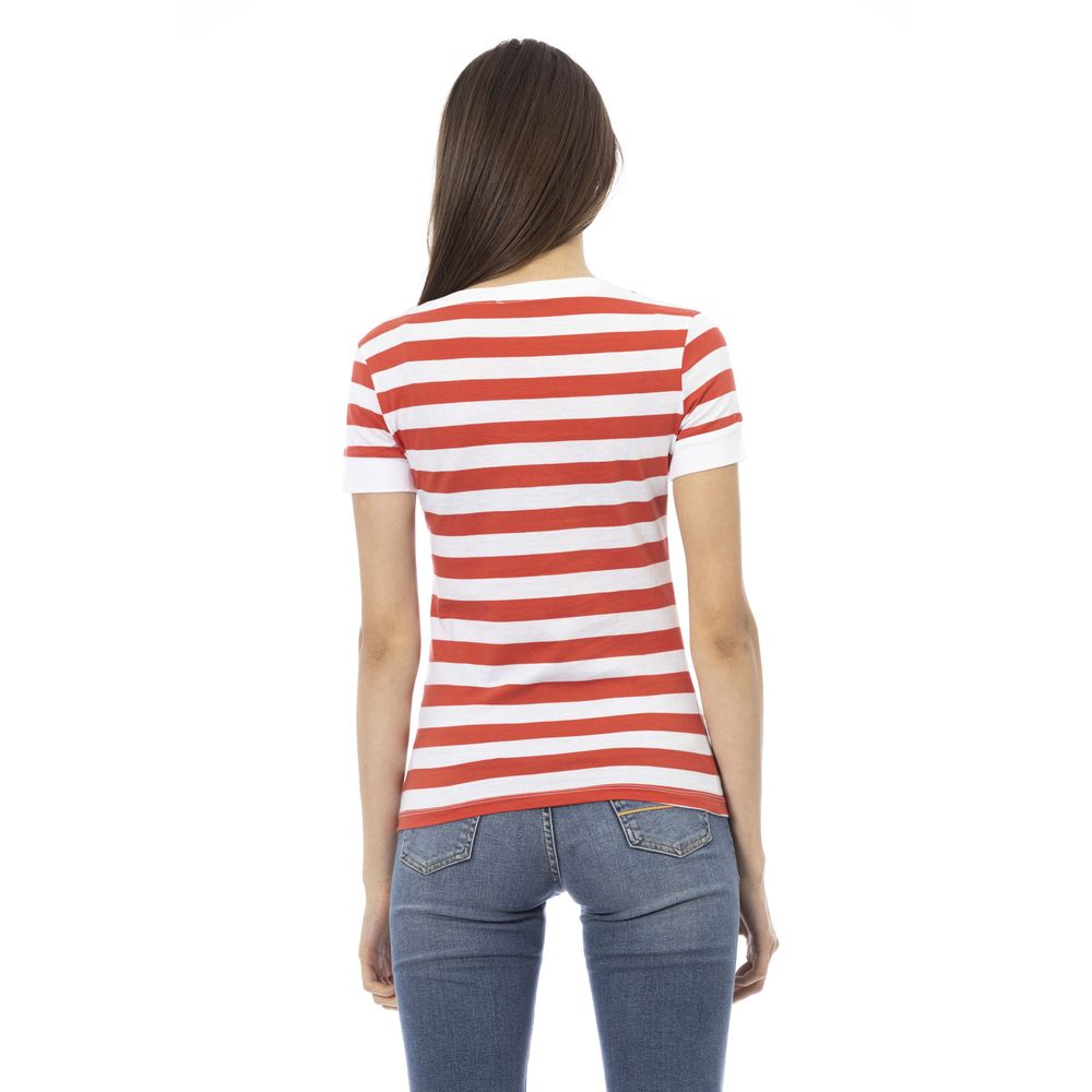 Woman wearing red and white striped shirt and blue jeans