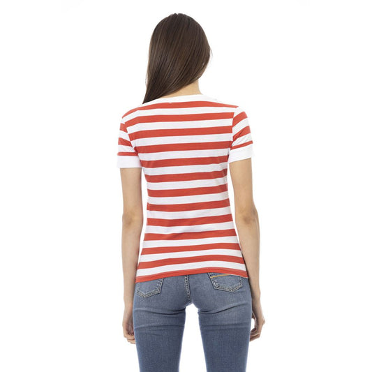 Woman wearing red and white striped shirt and blue jeans