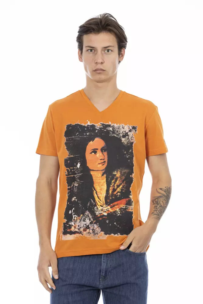 Man wearing orange t-shirt with portrait of woman on front