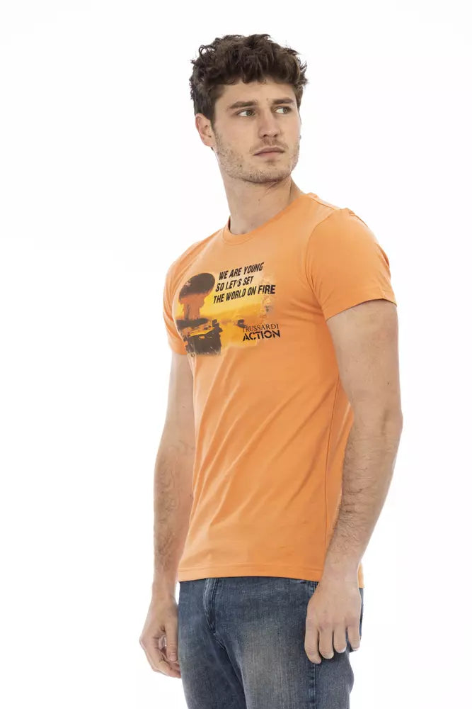 Man wearing orange t-shirt with graphic design on front