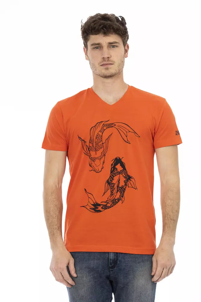 Man wearing orange t-shirt with black dragon design