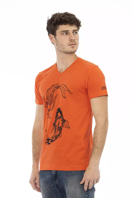 Man wearing orange t-shirt with graphic design on front