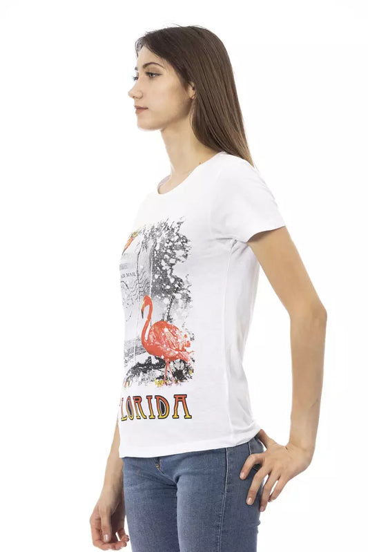 A white cotton women's t-shirt with a graphic print of a flamingo and palm trees