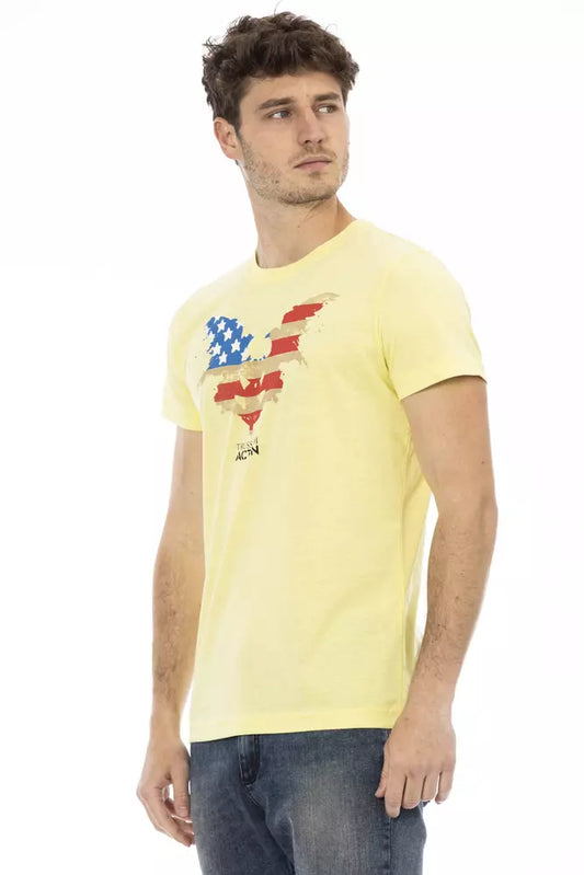 Man wearing yellow t-shirt with graphic design on front