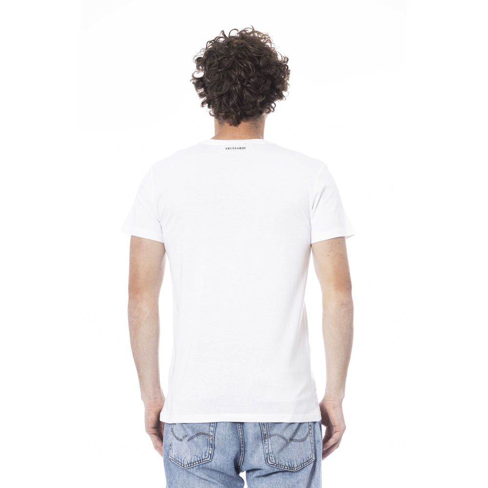 Man wearing white t-shirt and blue jeans