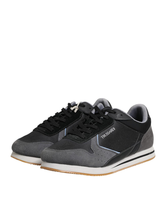 Pair of black and white sneakers