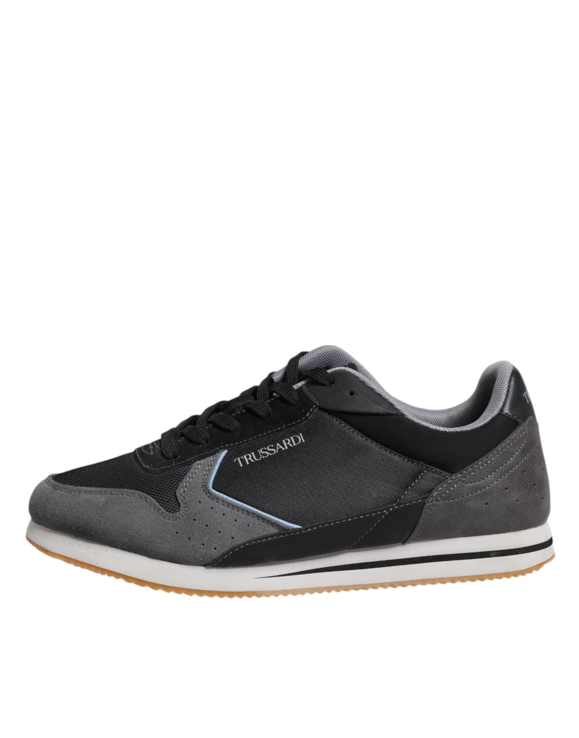 Black sneaker with white sole