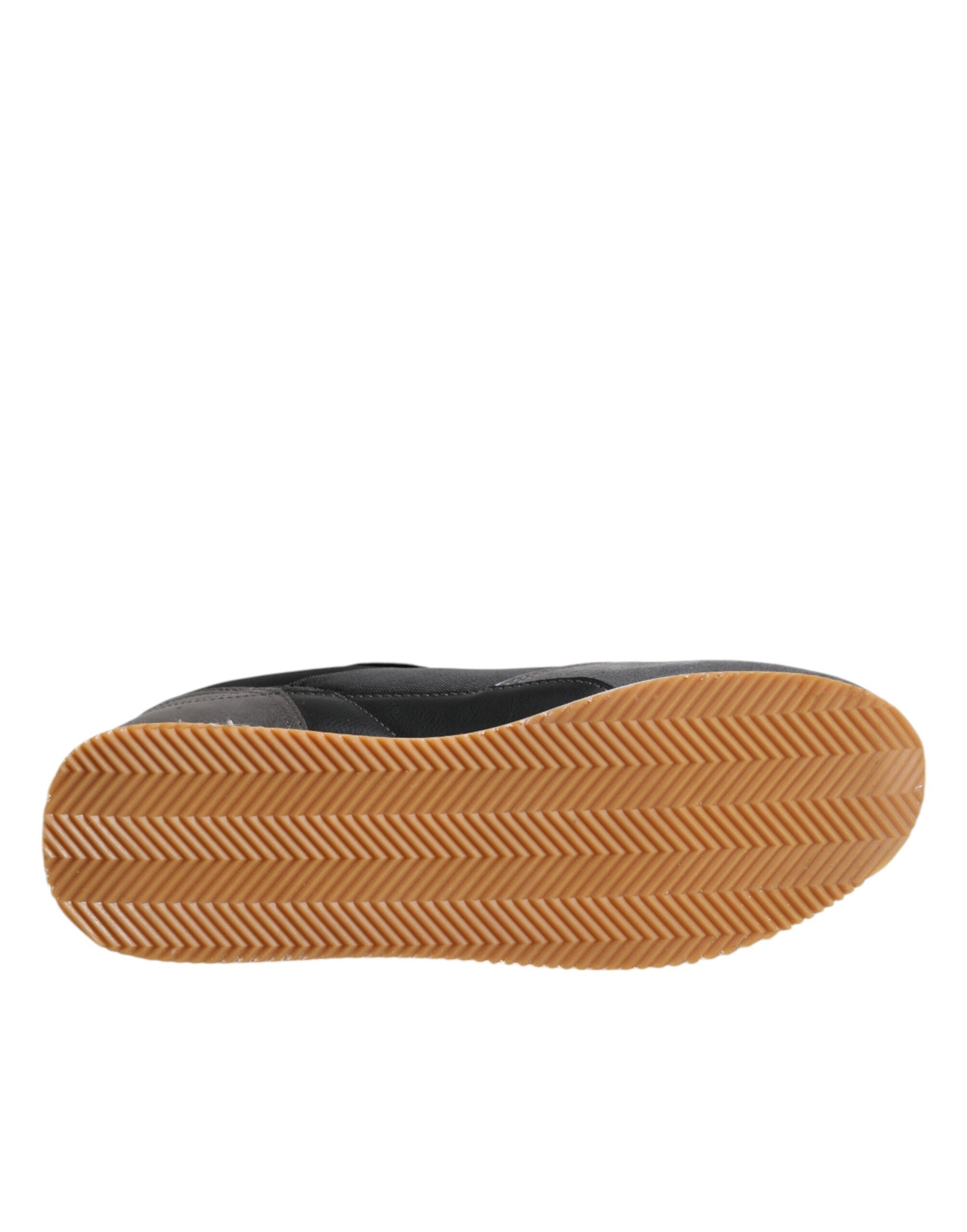 Brown shoe with orange sole