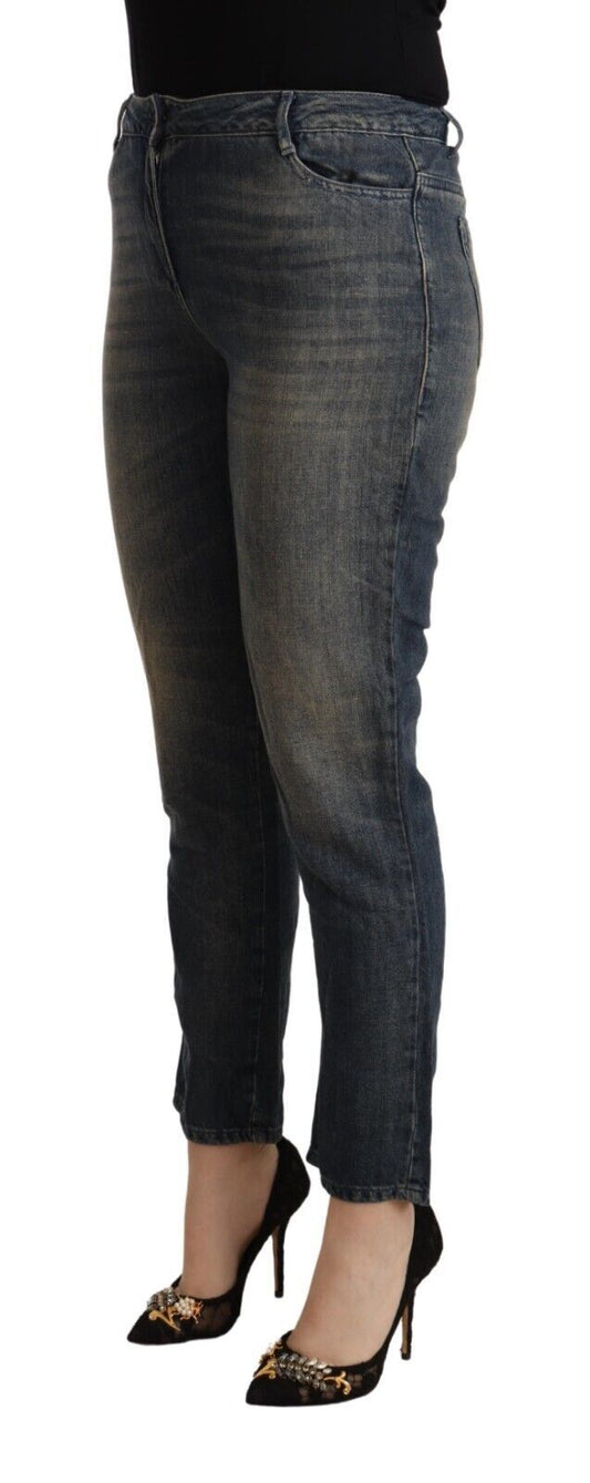 Woman wearing blue jeans and black high heels