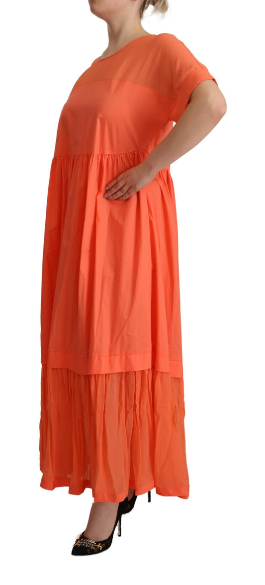 Long orange dress with ruffles on sleeves and hem
