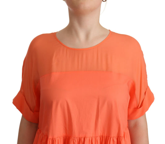 Woman wearing orange blouse
