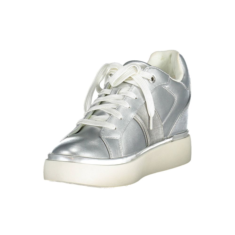 Silver women's sneaker with white laces and a chunky sole