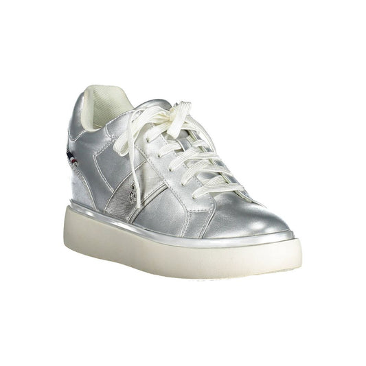 Silver women's sneaker with white laces and a chunky sole