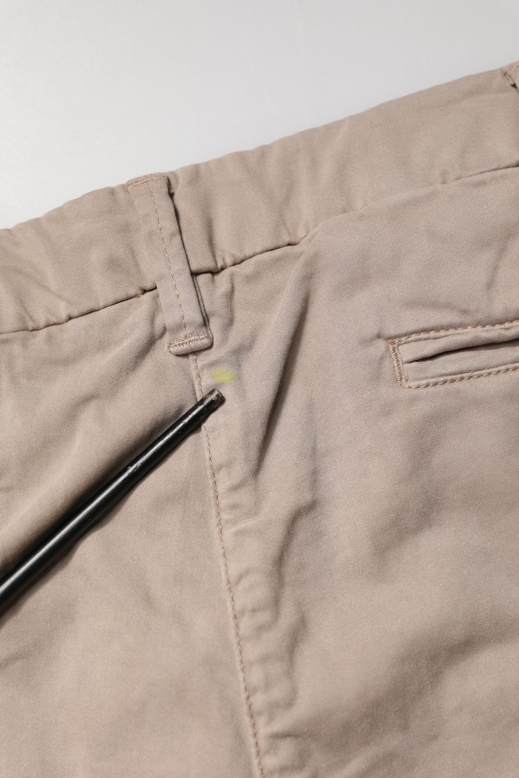 Tan pants with zipper fly
