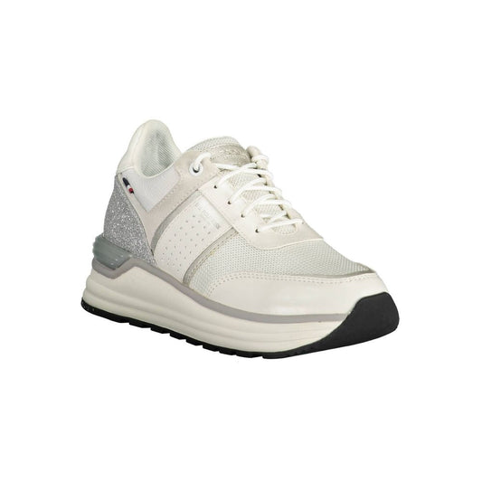 White women's sneaker with silver accents, featuring a lace-up closure and a logo on the side