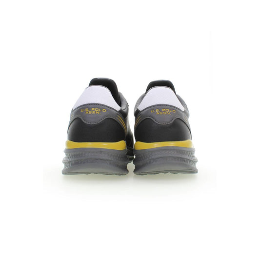 Pair of black and yellow men's sneakers with white laces, featuring the US Polo Assn logo on side