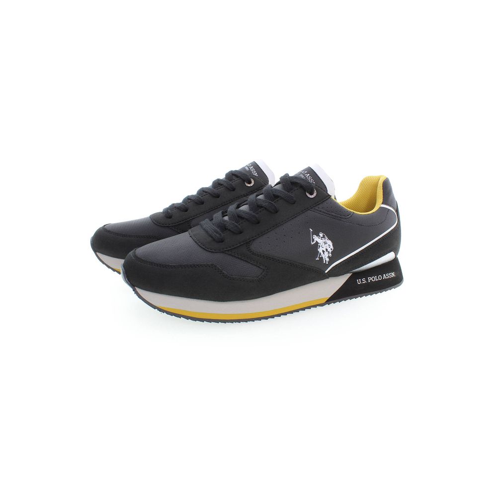 Pair of black sneakers with yellow accents