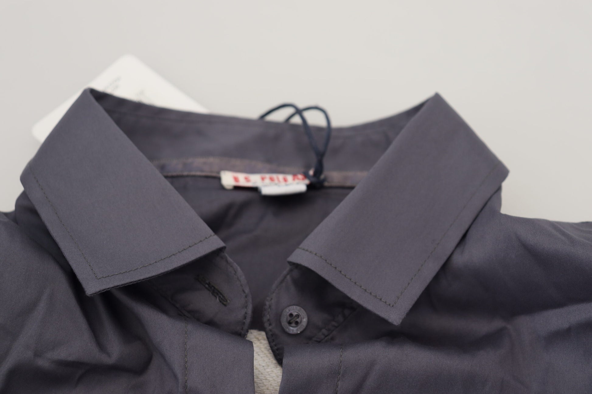 Navy blue jacket with collar turned up
