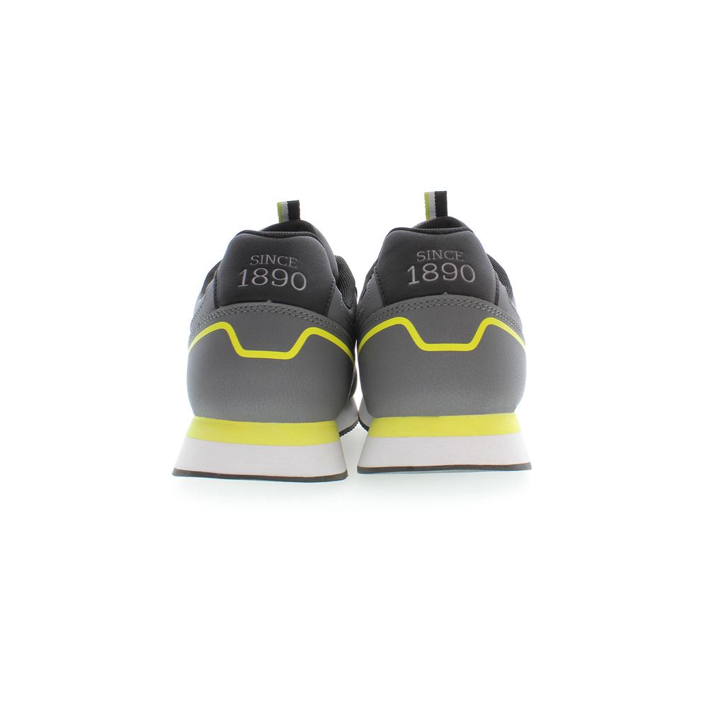 Pair of grey polyester men's sneakers with yellow accents and black laces, featuring the US Polo Assn logo on side