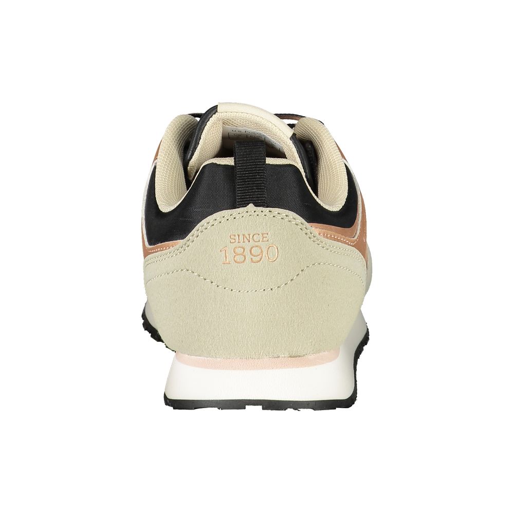 Tan and black women's sneaker with white sole, featuring the US Polo Assn logo on side