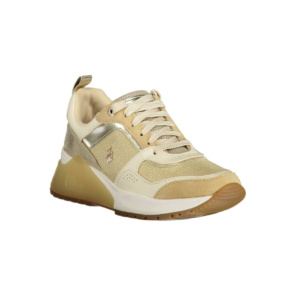 Gold women's sneakers with white sole, laces and logo