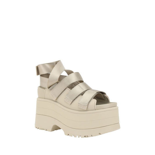 Tan sandal with strap over foot