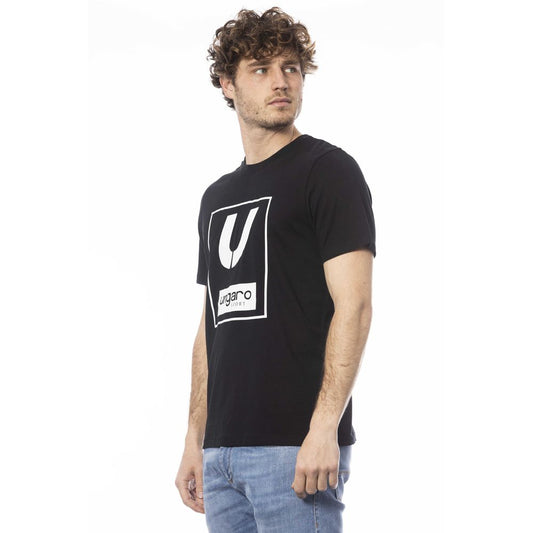 Man wearing black t-shirt with white logo
