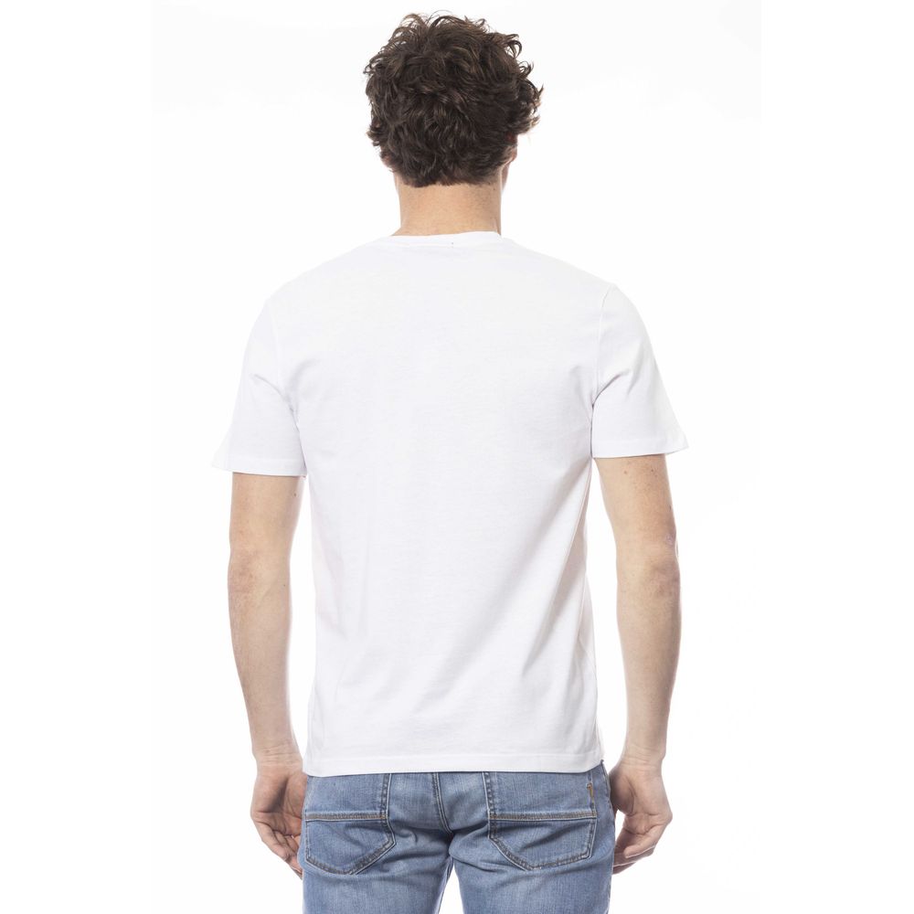 Man wearing white t-shirt and blue jeans