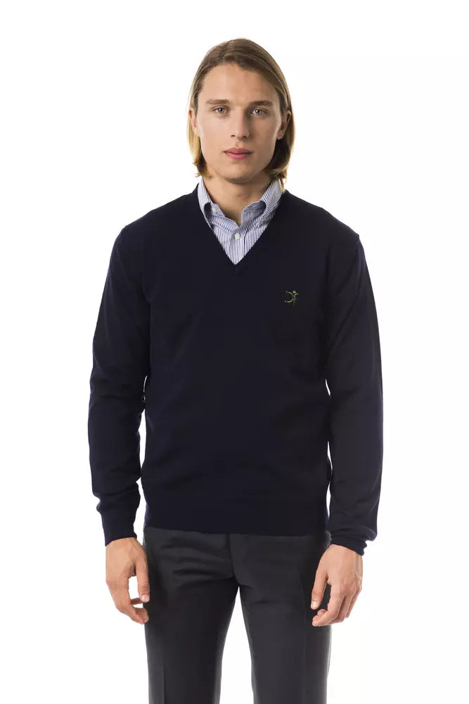 Man wearing dark blue sweater with white collar